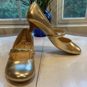 Kitten heel. Gold color.  Never worn.